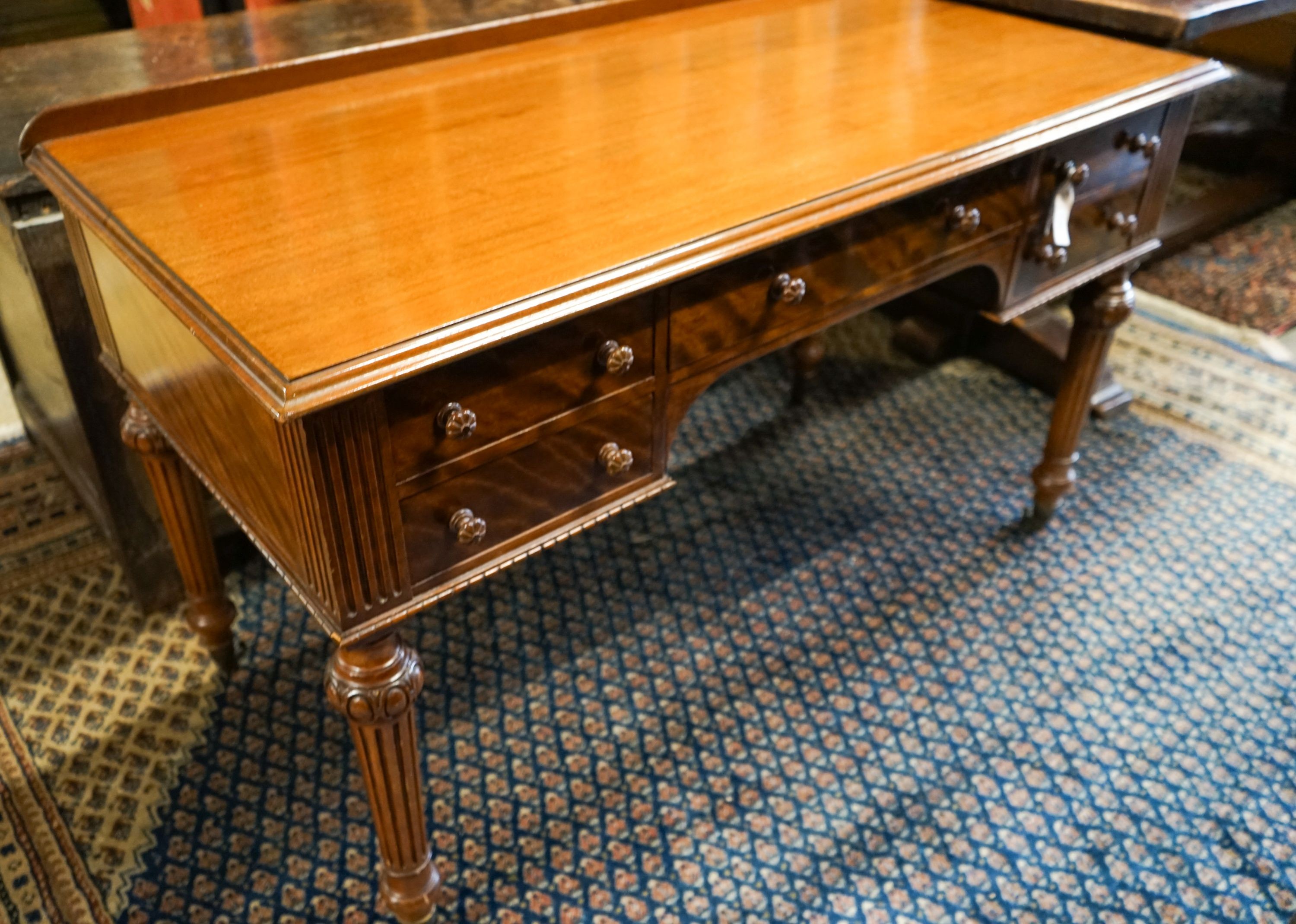 A Victorian mahogany dressing-cum-writing table